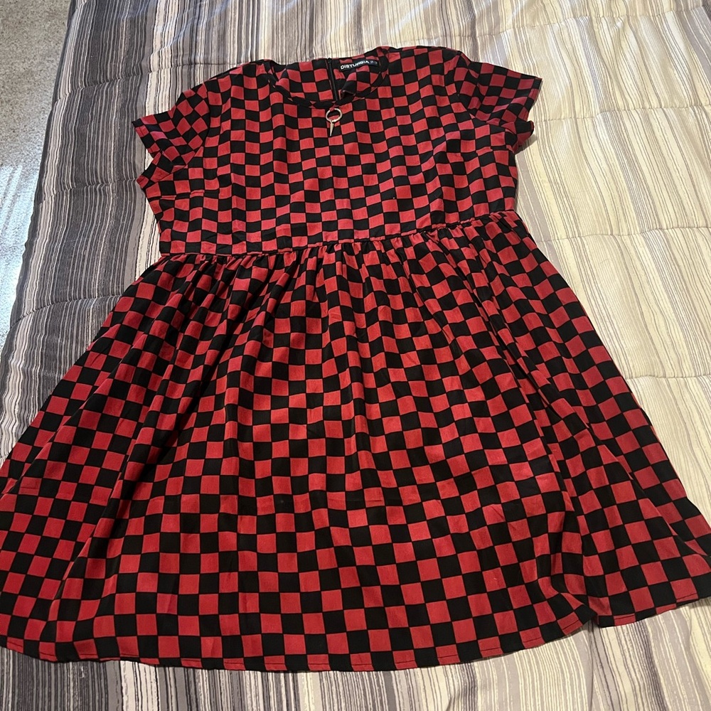 Women’s Disturbia dress. New without tags. Wore once. US size 14 . UK size 18.